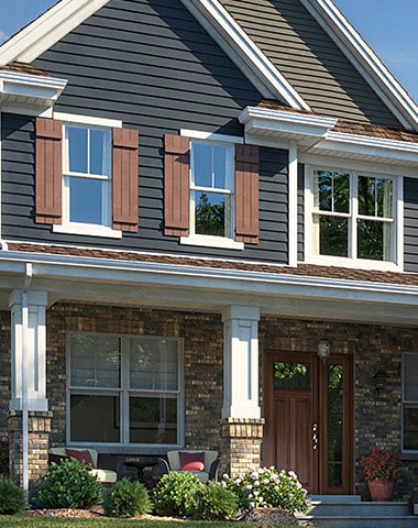 blue vinyl siding on residential house
