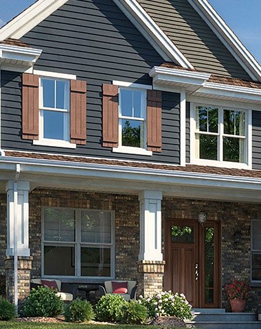 blue vinyl siding on residential house